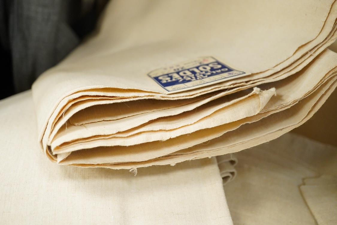 Ten French provincial cream coarse linen sheets, two unused with original Galleries Lafayette labels